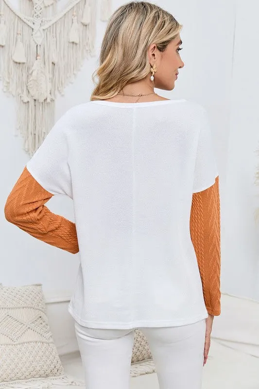 Cable knit color block round neck sweater